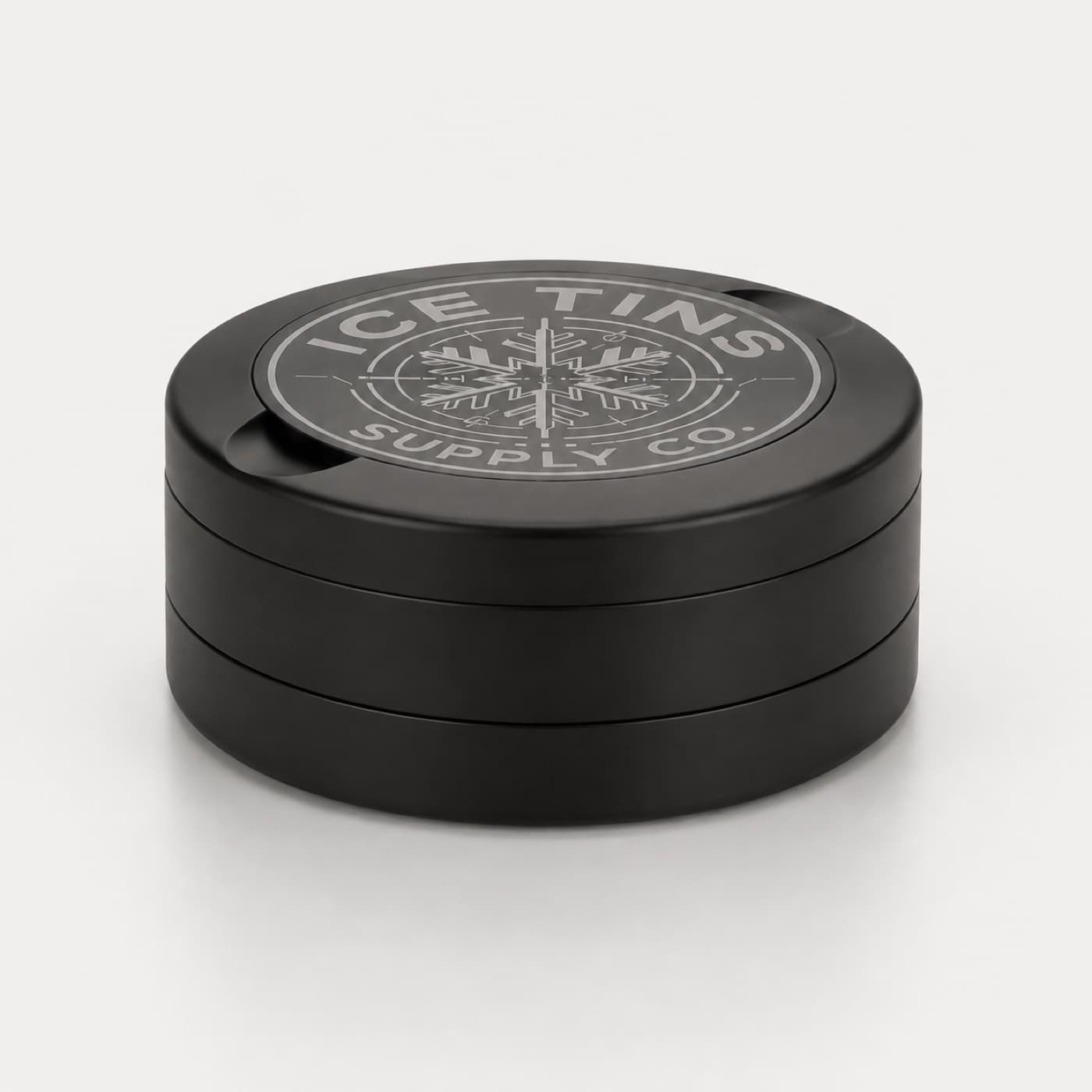 The Ice Tin on a white background, the three stacked floors and their seams clearly visible