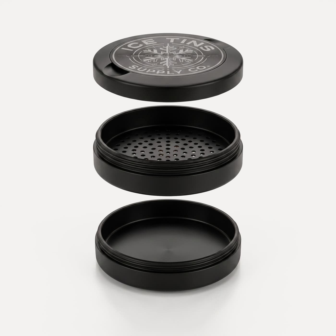 The Ice Tin taken apart: the lid, the pouch floor, and the ice pack tray
